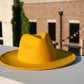 Bright yelow wide brim unisex fedora hat.