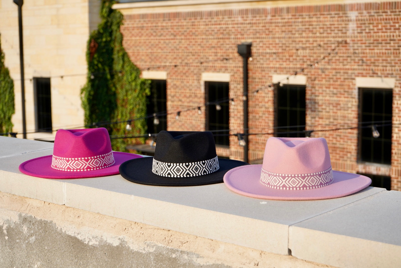 Pink, black, and fuchsia boho inspired hats for women.