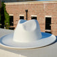 A white color wide brim fedora.
