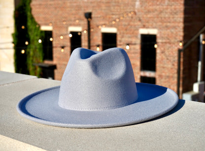 A gray color wide brim hat.