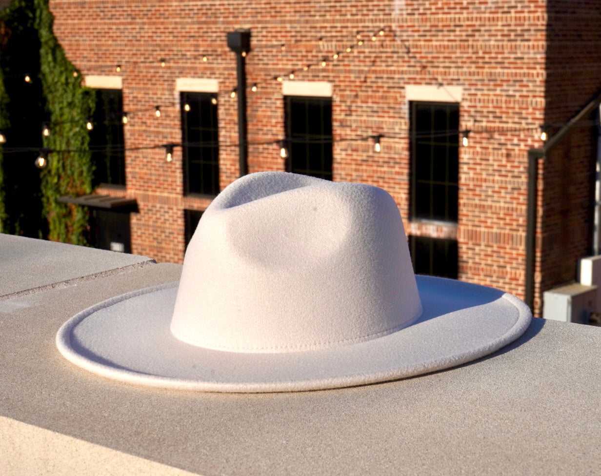 Cream color wide brim unisex fedora hat.
