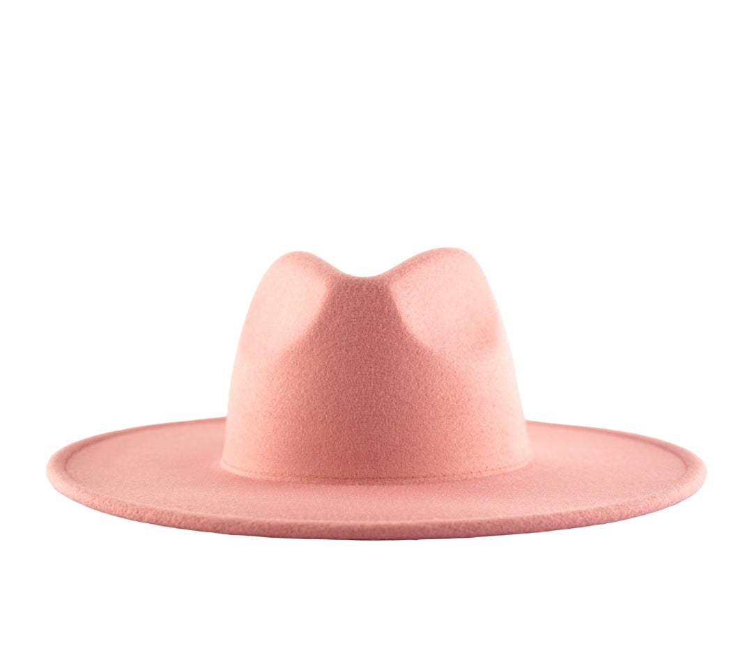 A wide brim fedora hat in a rose pink color.