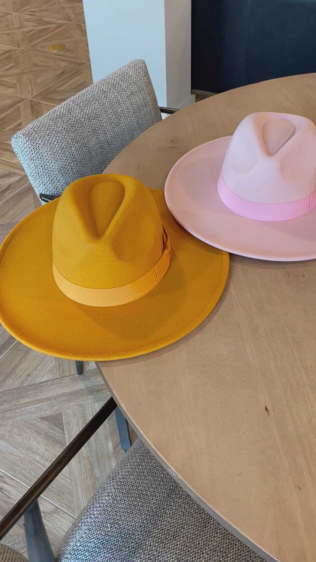 Video showing an assortment of dope hat's fedoras in various colors.