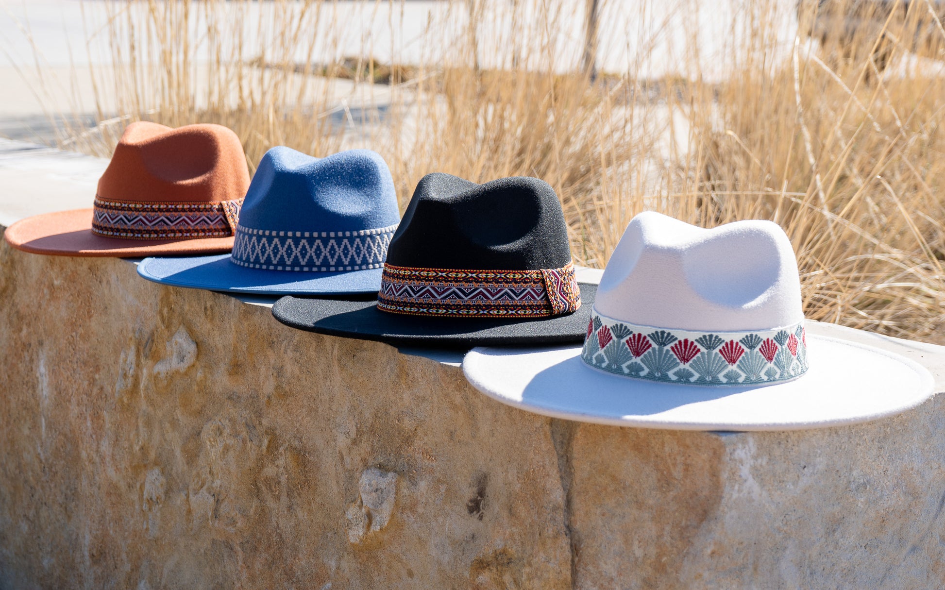 Dope Hat's wide brim fedoras with indigenous inspired headbands.