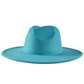 Side view of a teal colored fedora.